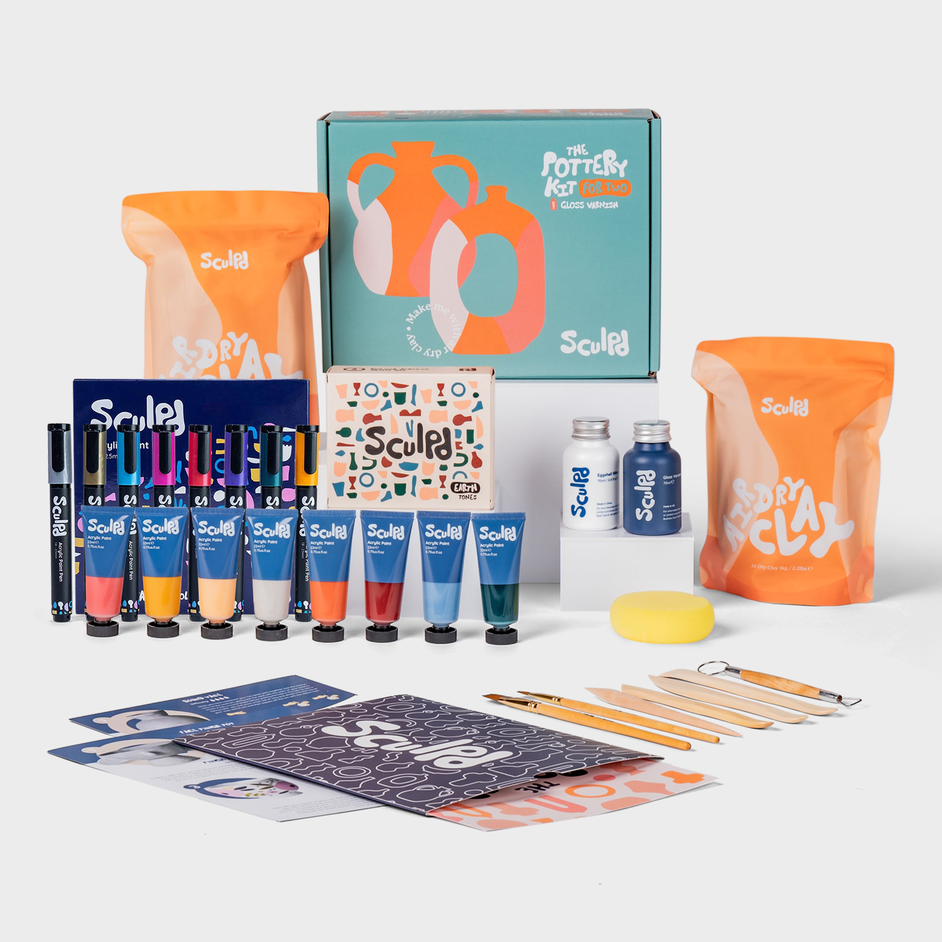 Sculpd pottery kit for two with varnishes, earth paints, and metallic pens set