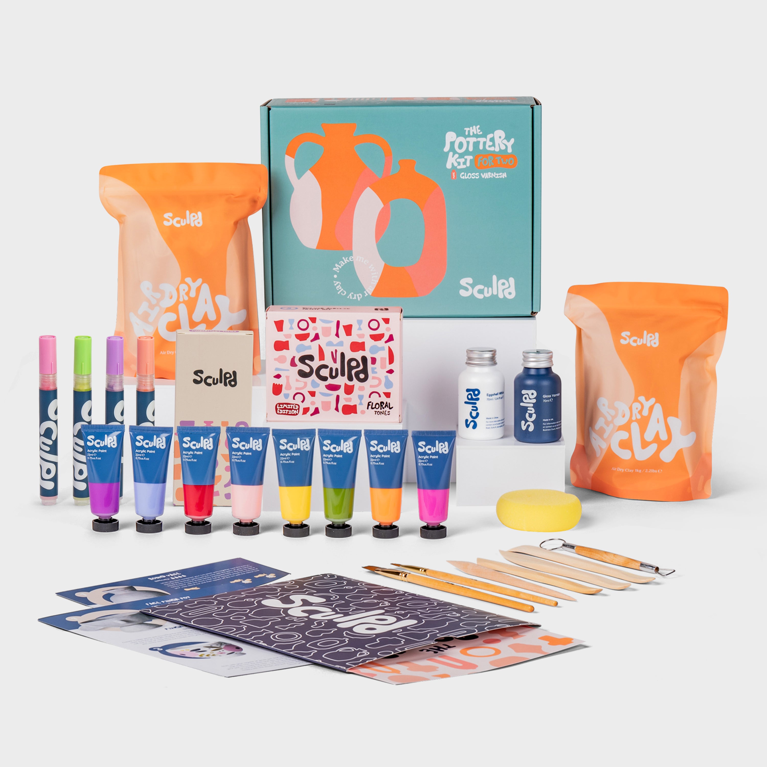 Sculpd pottery kit for two with varnishes, floral paints, and Modernist pens set