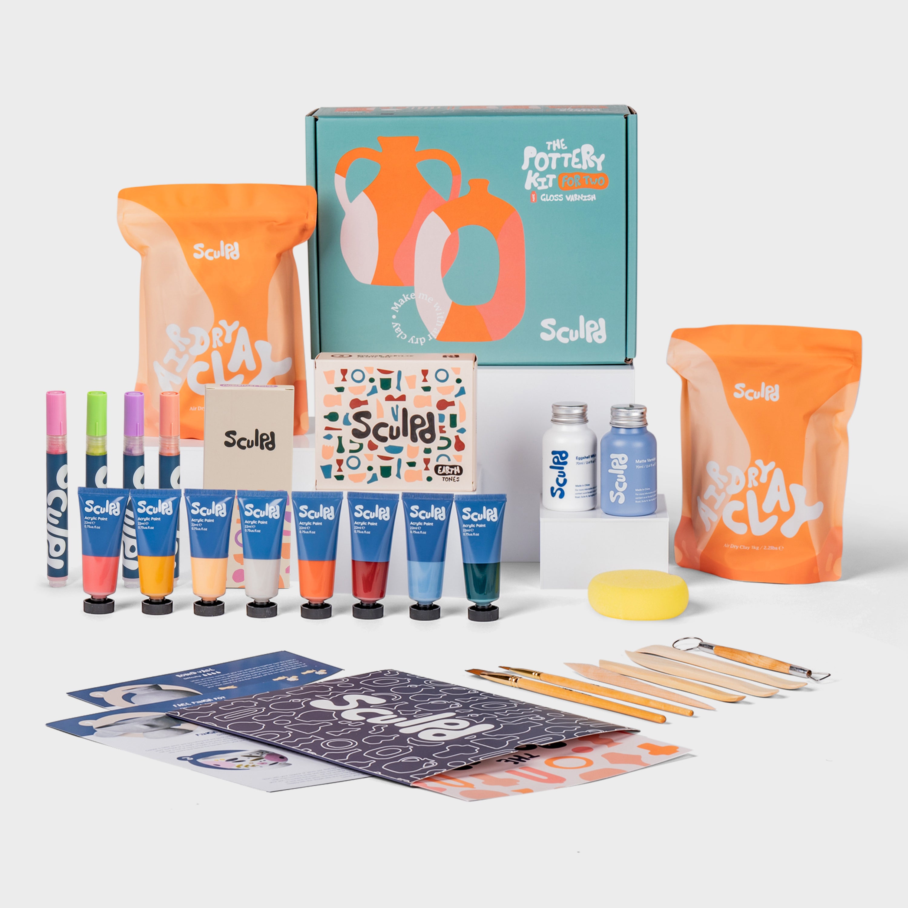 Sculpd pottery kit for two with earth paints, and modernist pens set