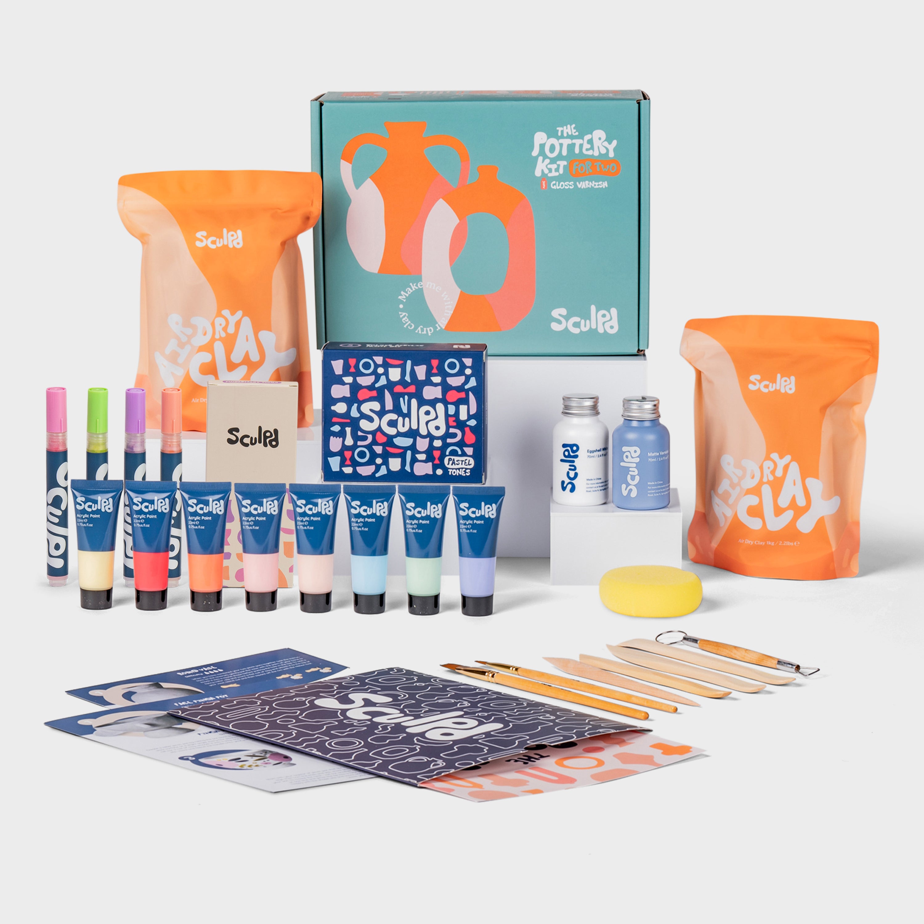 Sculpd pottery kit for two with pastel paints, and modernist pens set