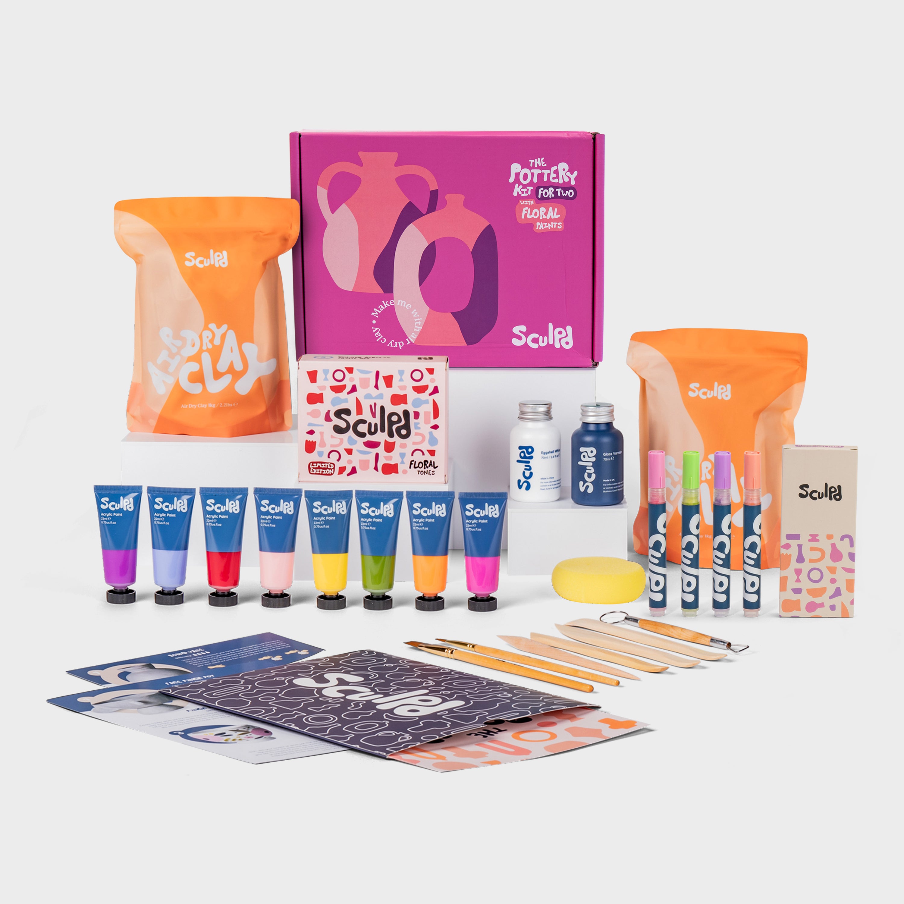 Sculpd pottery kit for two with varnishes, floral paints, and Modernist pens set